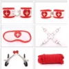 Kit de bondage temático de enfermera con 9 piezas, incluye esposas de cuerina suave y antifaz – Athenea Studios Sex Shop – set de BDSM para roleplay y principiantes, disponible en Bogotá, Medellín y toda Colombia