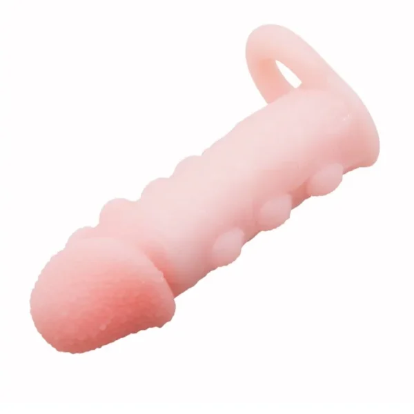 Funda para pene Brave Man tono piel con textura de balines y anillo testicular – Athenea Studios Sex Shop – extensor de pene realista manual para mayor grosor, disponible en Bogotá y toda Colombia