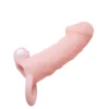 Funda para pene vibradora Brave Man color piel con venas realistas y anillo testicular – Athenea Studios Sex Shop – extensor con vibración para engrosamiento, disponible en Bogotá y toda Colombia